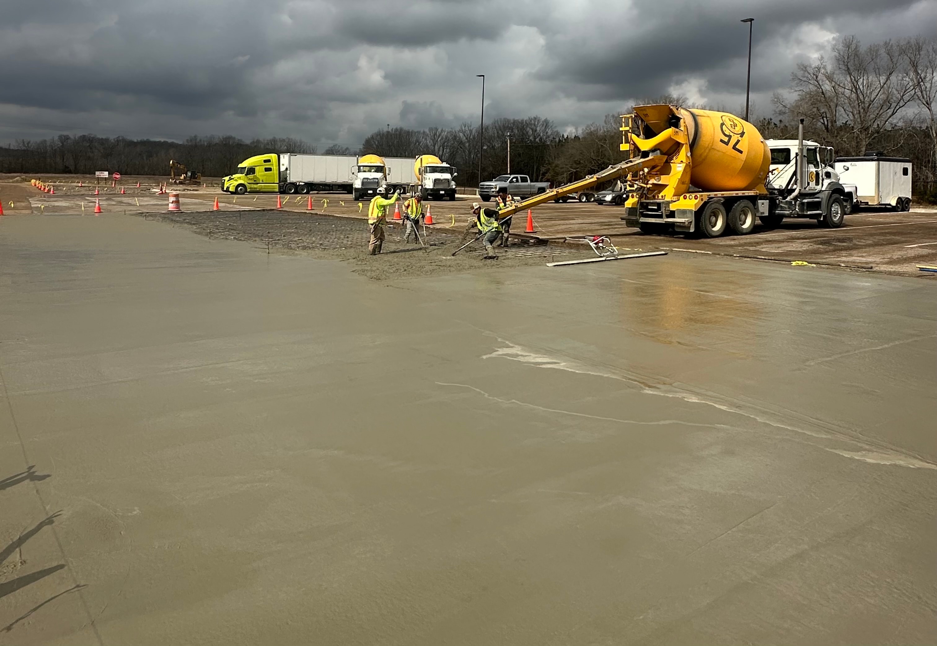Concrete pour with mixer truck at truck stop