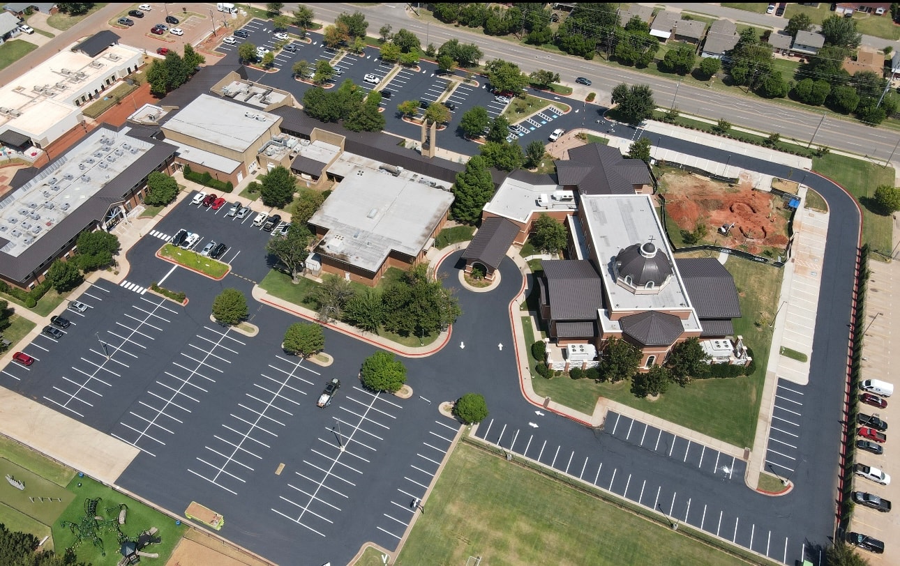 Aerial view of completed parking lot with fresh striping